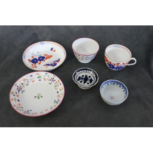 192 - A Lowestoft tea bowl and saucer, a tea cup and saucer, an English tea bowl, and an Iznik dish (6).