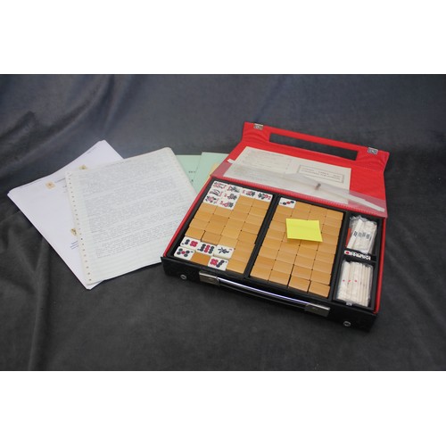 299 - A modern Mah-jong set, with rulebooks.