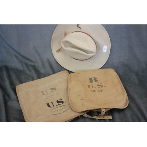 270 - A Rockmount U.S Cavalry style hat and two U.S postal mail bags.