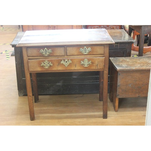 159 - A George III mahogany lowboy fitted three drawers, on square moulded legs, 76cm wide, a.f.