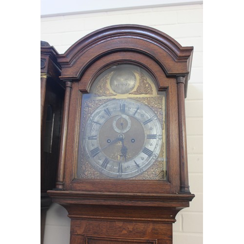 7 - A 19th century oak longcase clock, with arched hood, the trunk door with moulded edge, the eight-day... 