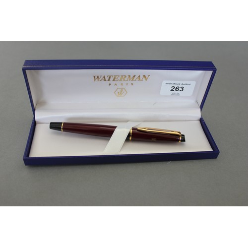 263 - A Waterman fountain style ball point pen in burgundy coloured case, letters NAC to barrel, in box.