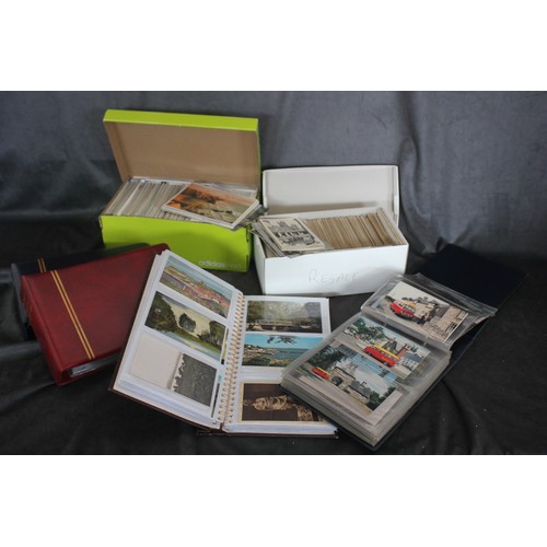 250 - Four albums of mixed postcards and two shoeboxes of loose cards (6).