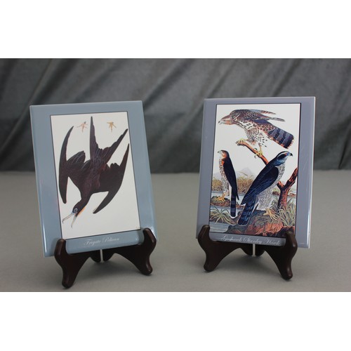 236 - Two porcelain tiles, decorated pictures of birds, after Audubon, each 20cm x 15cm (2).