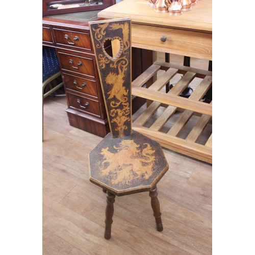 88 - A carved and stained wood spinning chair, with octagonal seat, on turned legs.