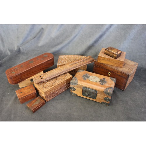 96 - Nine decorative small wooden boxes, a small leather snuff box, and a carved twin wooden flute (11).