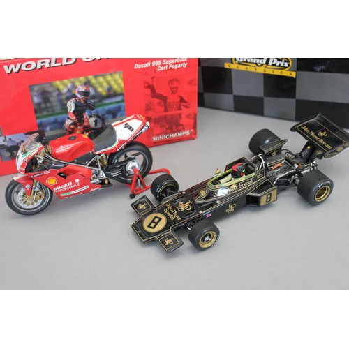 219 - A Grand Prix classics Lotus Ford Type 72D racing car, 1:18 scale and a 1:12 scale 