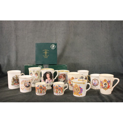 135 - A Crown Staffordshire Queen Elizabeth II Silver Jubilee mug, in box, a ditto commemorating the weddi... 