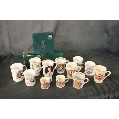 135 - A Crown Staffordshire Queen Elizabeth II Silver Jubilee mug, in box, a ditto commemorating the weddi... 