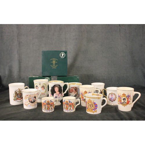 209 - A Crown Staffordshire Queen Elizabeth II Silver Jubilee mug, in box, a ditto commemorating the weddi... 