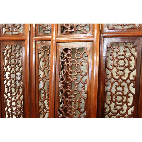 3 - A 20th century Chinese rosewood four panel screen, with carved and pierced decoration, approx. 118cm... 