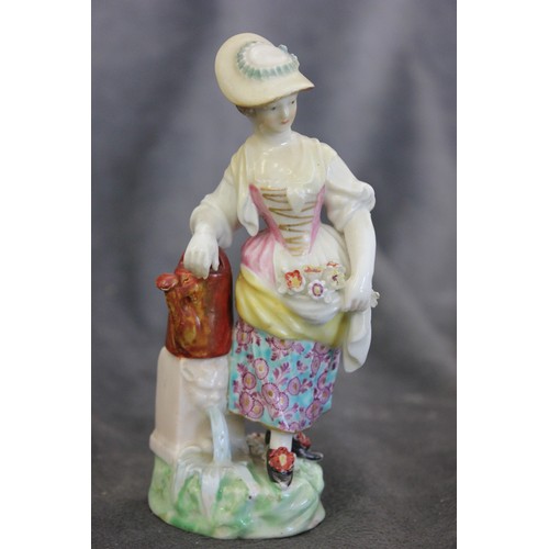 63 - A Derby porcelain figure of female gardener, c. 1780, on mound base, wearing brimmed hat, incised No... 