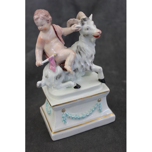 65 - A Derby porcelain figure of putto riding a goat, on plinth base, patch marks, and incised No. 13, 16... 