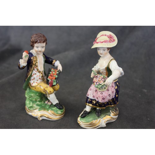 67 - A pair of Derby figures of children as gardeners, c. 1820, on gilded scroll bases, incised No. 8, ea... 