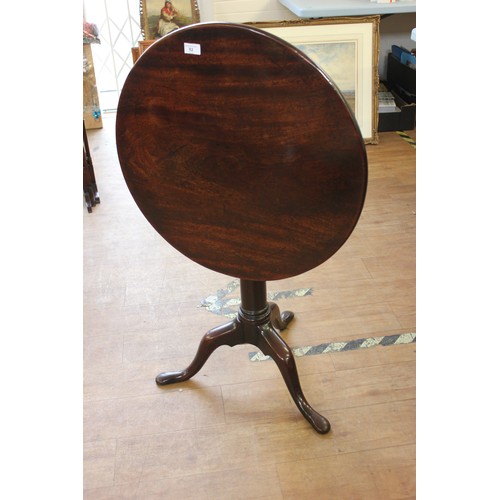 82 - A George II circular snap top mahogany tripod table, c. 1740, the top 63cm in diameter, ex Cheverton... 