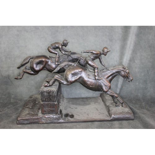 94 - G. Coello 1988 - bronze group of two race horses with jockeys up, jumping a water jump fence, No. 19... 