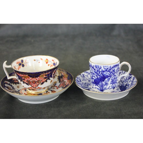 145 - A Derby Imari teacup and saucer, circa 1810-1815, and a Derby blue and white coffee can and saucer (... 