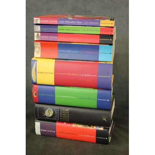 234 - Set of eight Harry Potter books, four paperback and four hardbacks. (7).