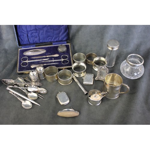 345 - A small George III silver mug, London 1814, a small silver manicure set, Birmingham 1899, in lined c... 