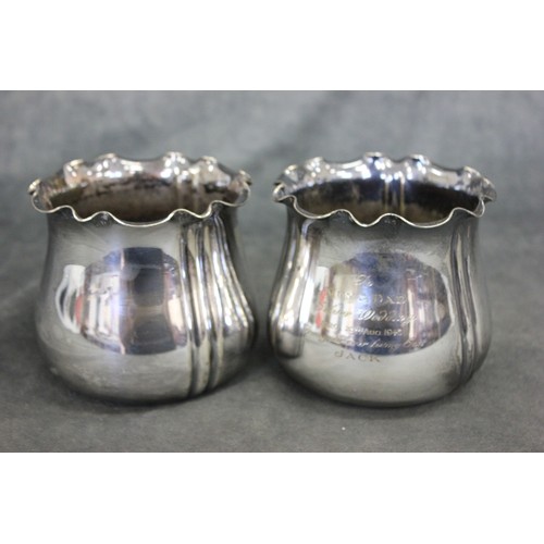 226 - A pair of silver-plated jardinières by Mappin and Webb, each 10cm high, with engraved inscription (2... 