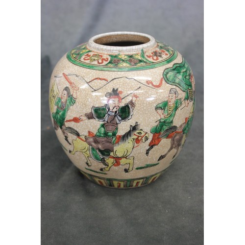 228 - An early 20th century Chinese crackle glaze vase decorated battle scenes, 17cm high.