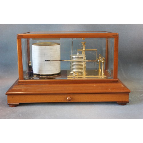 181 - A 20th century barograph in pale mahogany case, with bevelled glass panels, by 