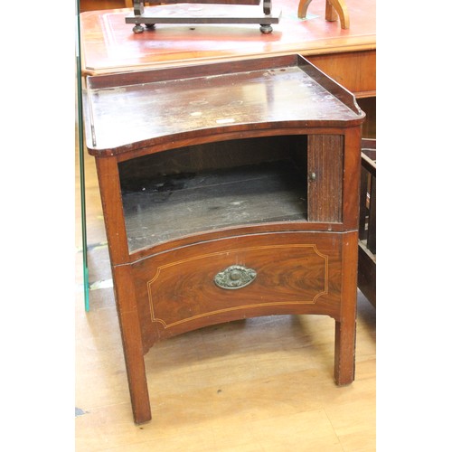 243 - A George III mahogany concave night cabinet, with galleried top and tambour shutter, on square legs,... 