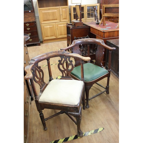 241 - An 18th century elm corner elbow chair, on x stretchered base, and a later mahogany chair (2).