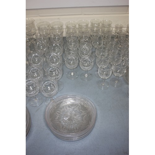 223 - A part suite of Stuart glass drinking glasses, with etched decoration, ten and twelve place settings... 