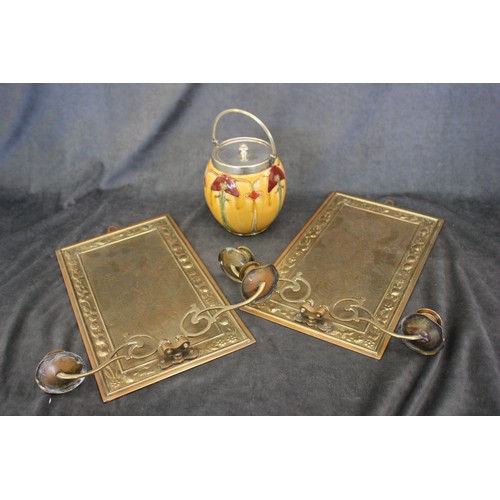 32 - A pair of copper wall appliques, each with two candle holders, and a biscuit barrel with silver-plat... 