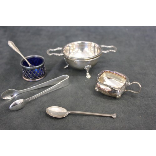 192 - An Elizabeth II silver tea strainer and stand, Birmingham 1997, a silver-plated mustard pot, no cove... 