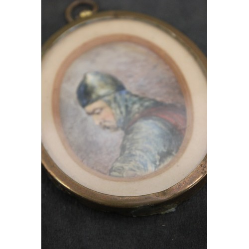 170 - A miniature portrait of a knight, wearing a Surcoat and a Helmet, 6cm x 7cm.