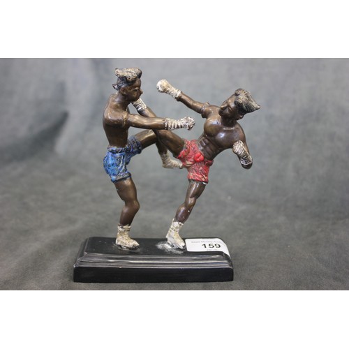 159 - A cold painted bronze group of two kickboxers, on stepped base, 14.5cm high.