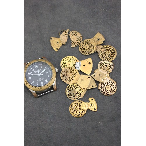 101 - A selection of gilt metal watch cocks and a 