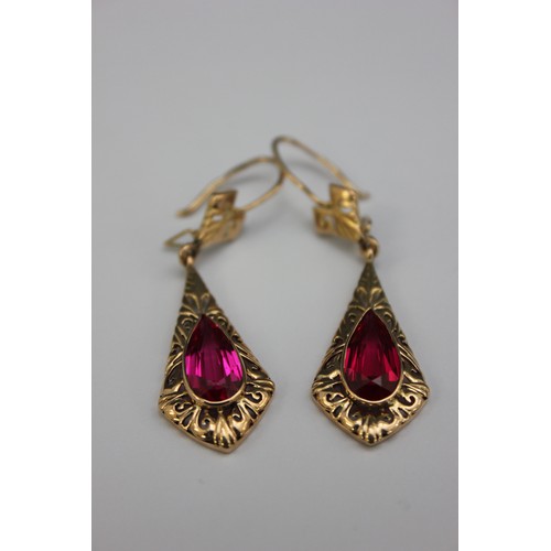 102 - A 14 carat gold drop earring set, with synthetic red stone, gross weight 5g.