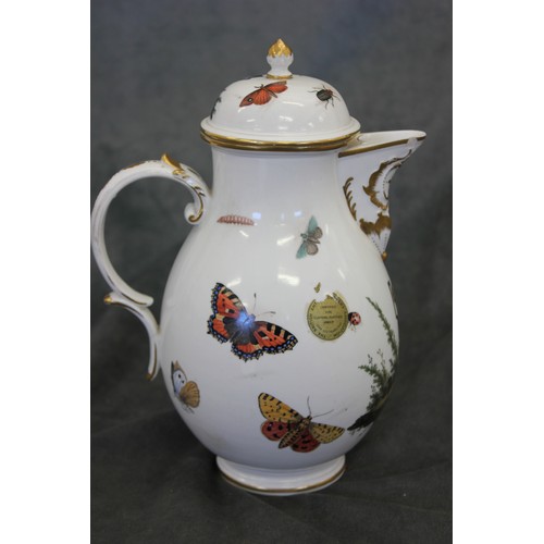 129 - A 19th century Fulda porcelain coffee pot, with gilt edge, decorated butterflies, moths, and urn, do... 