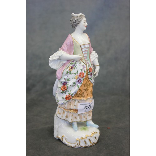 128 - A Dresden style porcelain figure of a woman in pose, wearing period costume, 24cm high.