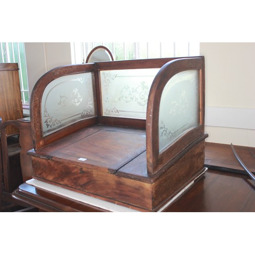 1 - A late Victorian/Early Edwardian mahogany cash desk, with etched glass panels on three sides, slopin... 