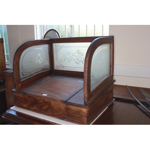 1 - A late Victorian/Early Edwardian mahogany cash desk, with etched glass panels on three sides, slopin... 