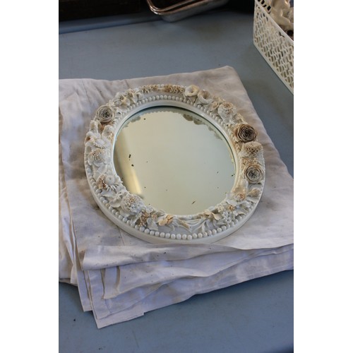 28 - A Stevenson and Hancock Derby porcelain oval mirror, with relief decoration of flowers and buds, 33c... 