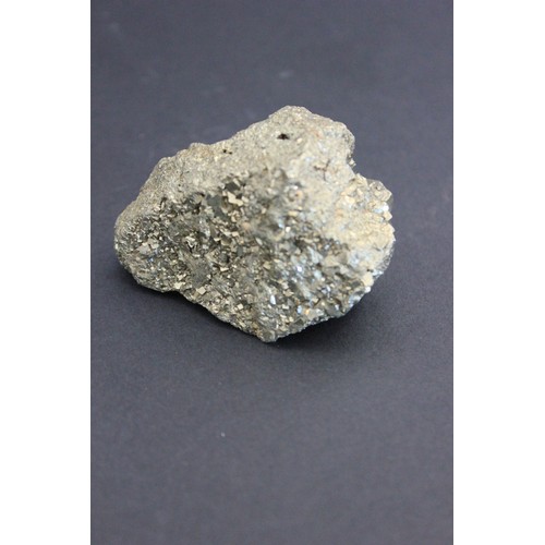 32 - A piece of natural metal, of rough ingot form, possibly Indian heeryte, 6cm.