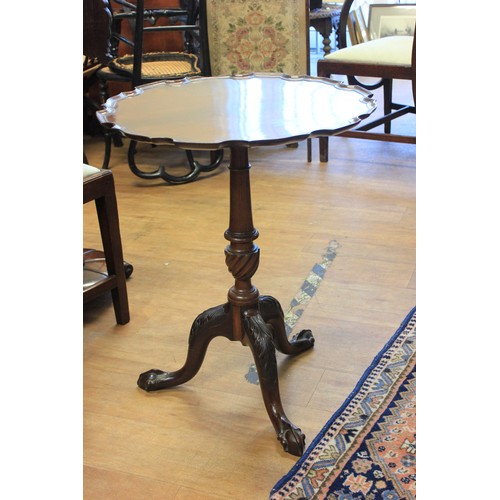 37 - A George III oak tripod table, with fixed circular top, 58cm in diameter,a.f.