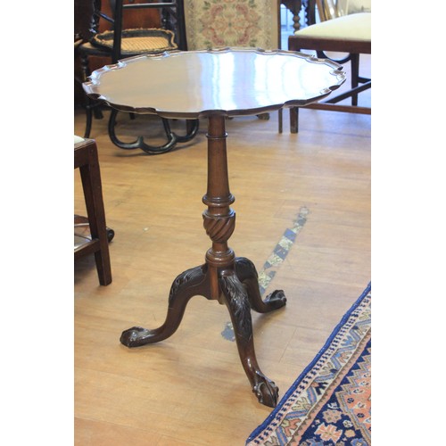 37 - A George III oak tripod table, with fixed circular top, 58cm in diameter,a.f.