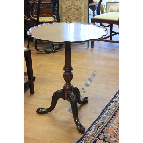 37 - A George III oak tripod table, with fixed circular top, 58cm in diameter,a.f.