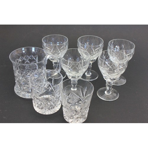 43 - Five Brierley lozenge cut glass wine glasses, two non-matching spirit tumblers, and a beer mug, one ... 