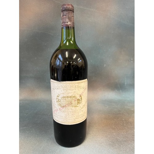 51 - A magnum of Chateau Margaux 1975, Premier grand cru, liquid level high shoulder, slightly discoloure... 