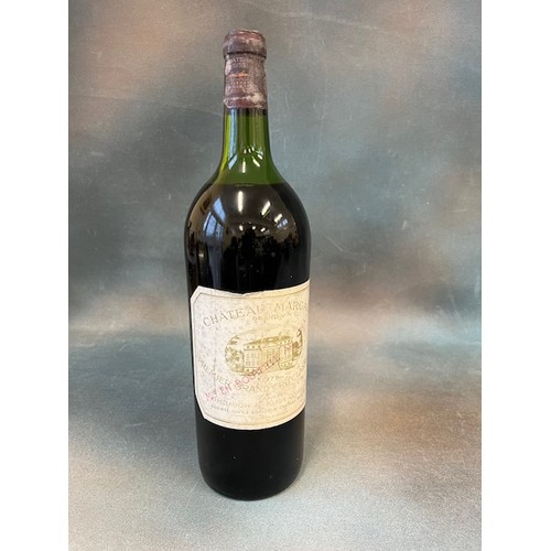 51 - A magnum of Chateau Margaux 1975, Premier grand cru, liquid level high shoulder, slightly discoloure... 