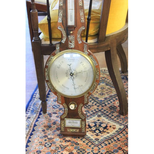 139 - A 19th century mother-of-pearl inlaid rosewood wheel barometer by 