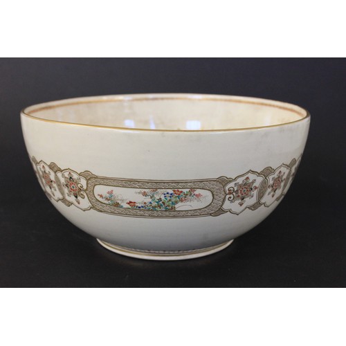 149 - A large Chinese pottery bowl, decorated dragons and floral panels, 30cm in diameter, a.f.