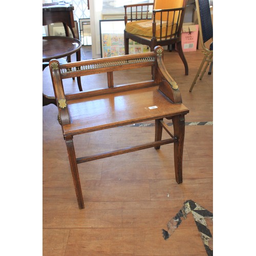 295 - A late 19th century oak window seat, with some brass fittings, 55cm wide.